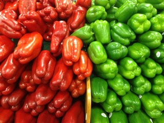 Beautiful Variety of Red and Green Bell Peppers at the Market