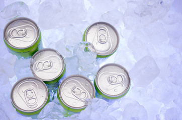 green Cans of Beer in Ice Cubes