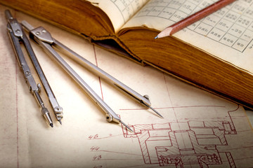 Old engineering drawing and book