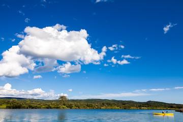 Calm River and Woman Kayaking