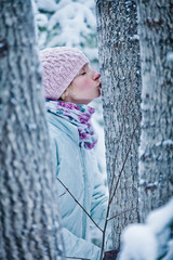 Lovely Girl Kissing a Tree in Forest (Ecology Concept)