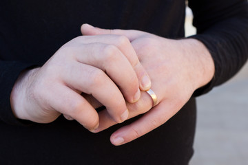 Man hands with wedding ring