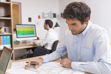 Business man working on laptop in office