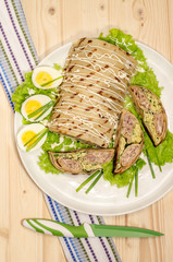 Terrine with chicken, cheese and pancakes