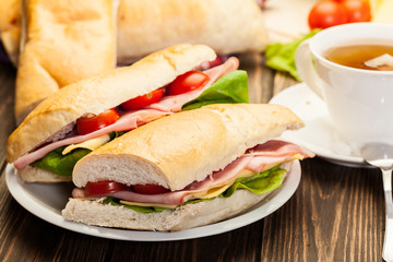 Panini sandwich with ham, cheese and tomato