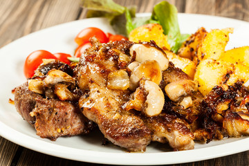Fried pork chop with mushrooms