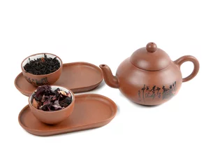 Foto op Aluminium clay teapot and cups with tea © RNG