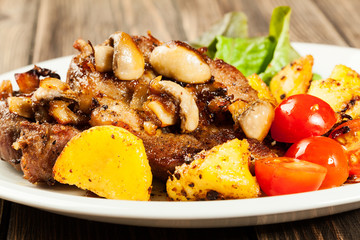 Fried pork chop with mushrooms