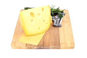 Cheese on Wooden Background