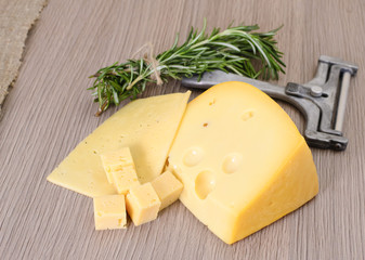 Cheese on Wooden Background