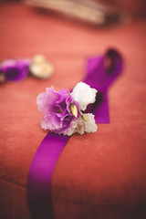 Obraz na płótnie Canvas groom boutonniere buttonhole wedding flowers