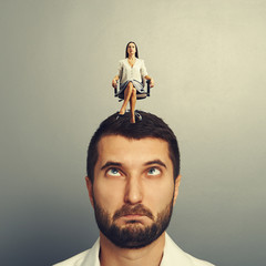 serious woman screaming at stupid man