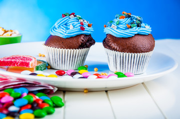 Home baked sweets on the bright, blue background
