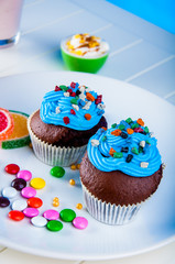 Home baked sweets on the bright, blue background