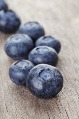 ripe blueberries on wooden table