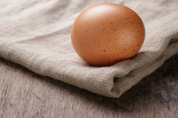 speckled chicken egg or old table