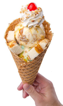 scoop ice creams with cone on background and topping