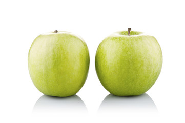Two green apples isolated on white background.