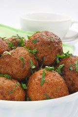 Fried pork meatballs in bowl