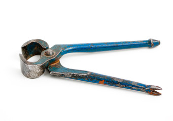 Rusty metal nippers isolated on white background
