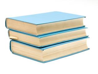 Stack of old books isolated on white background