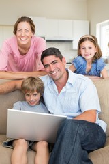 Family using laptop together