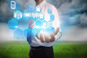 Businessman presenting interface menu with apps