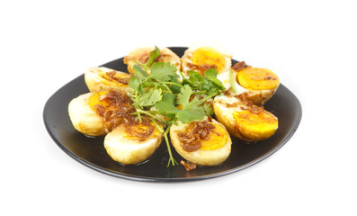 Dish of Thai traditional food - Egg with tamarind sauce