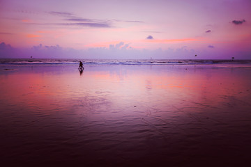 Sunset on Baga beach. Goa - obrazy, fototapety, plakaty