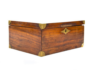 Closed wooden box over isolated white background