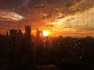 rainning over sunset