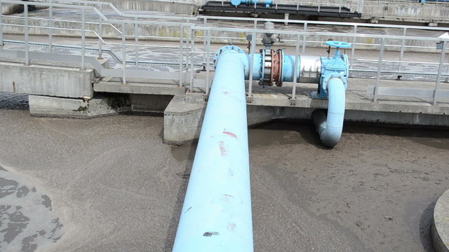 turn view sewage water sludge settle mechanism treatment plant