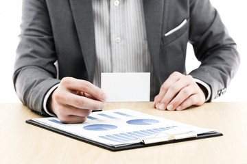 Businessman showing blank business card