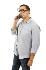 young man with a phone and glasses, isolated on white