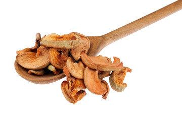 Wooden spoon with dried apple