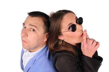 Man and woman with funny faces isolated over white background