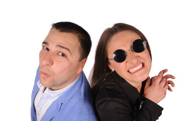 Man and woman with funny faces isolated over white background