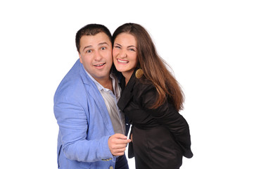 Man and woman with funny faces isolated over white background