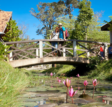 Beautiful romantic couple on bridge, Cambodia.