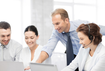 group of people working in call center