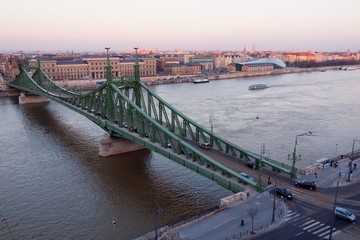 Fototapeta na wymiar city landscape with green bridge