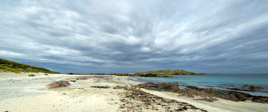 Panorama colour image of Isle of Iona beach on a cloudy day