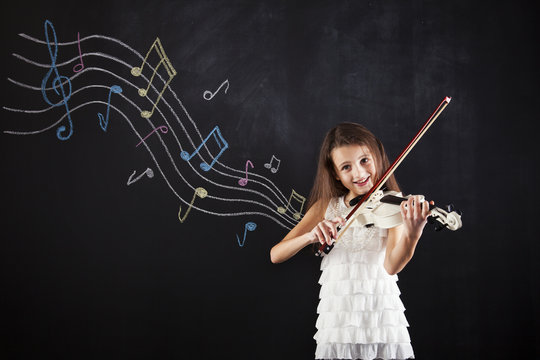 Female child playing the violin
