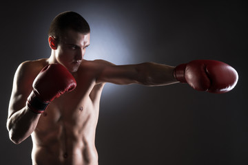 Fighter's kick. Studio shot.