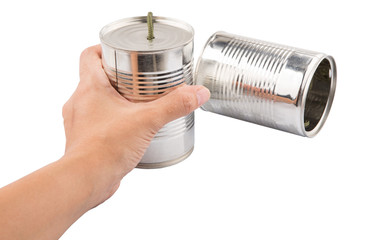 Female hand holding a tin can telephone
