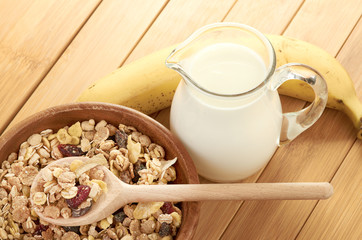 Delicious and healthy cereal in bowl with milk