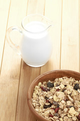 Delicious and healthy cereal in bowl with milk