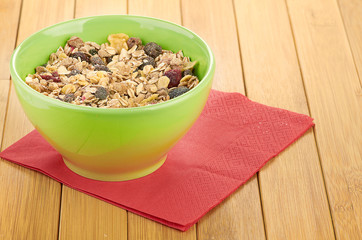 Delicious and healthy cereal in bowl with milk