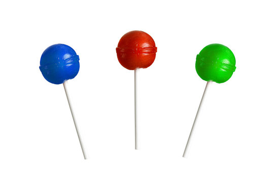 Red, blue and green lollipop isolated on white background.
