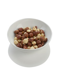 hazel nut and white bowl on white background